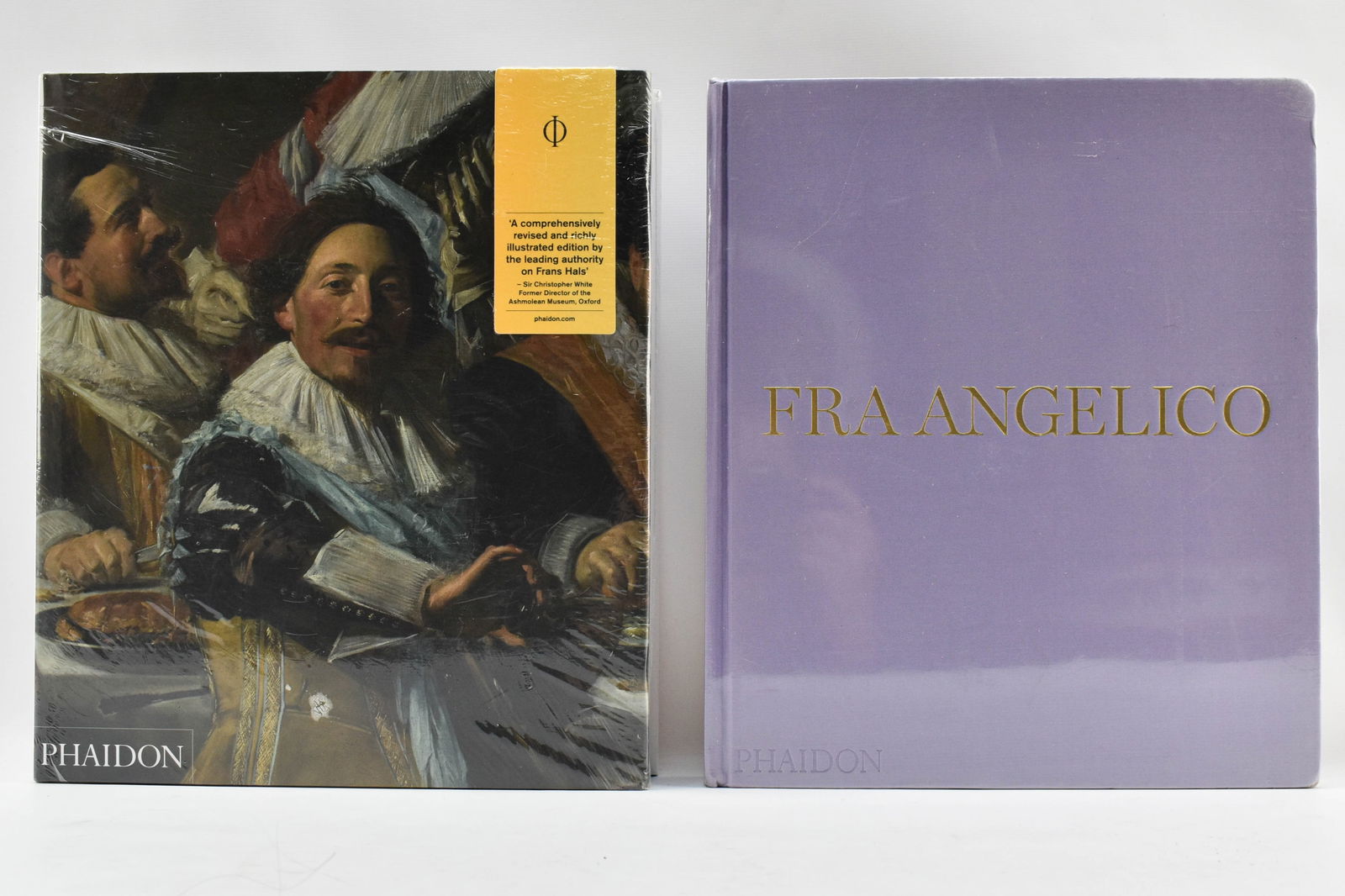 Two Unopened Phaidon Art Books, Frans Hals and Fra Angelico: Two hardcover coffee table books published by Phaidon including Frans Hals by Seymour Slive and Fra Angelico by Diane Cole Ahl. Both are new in shrink wrap. Each features full-page color illustrations