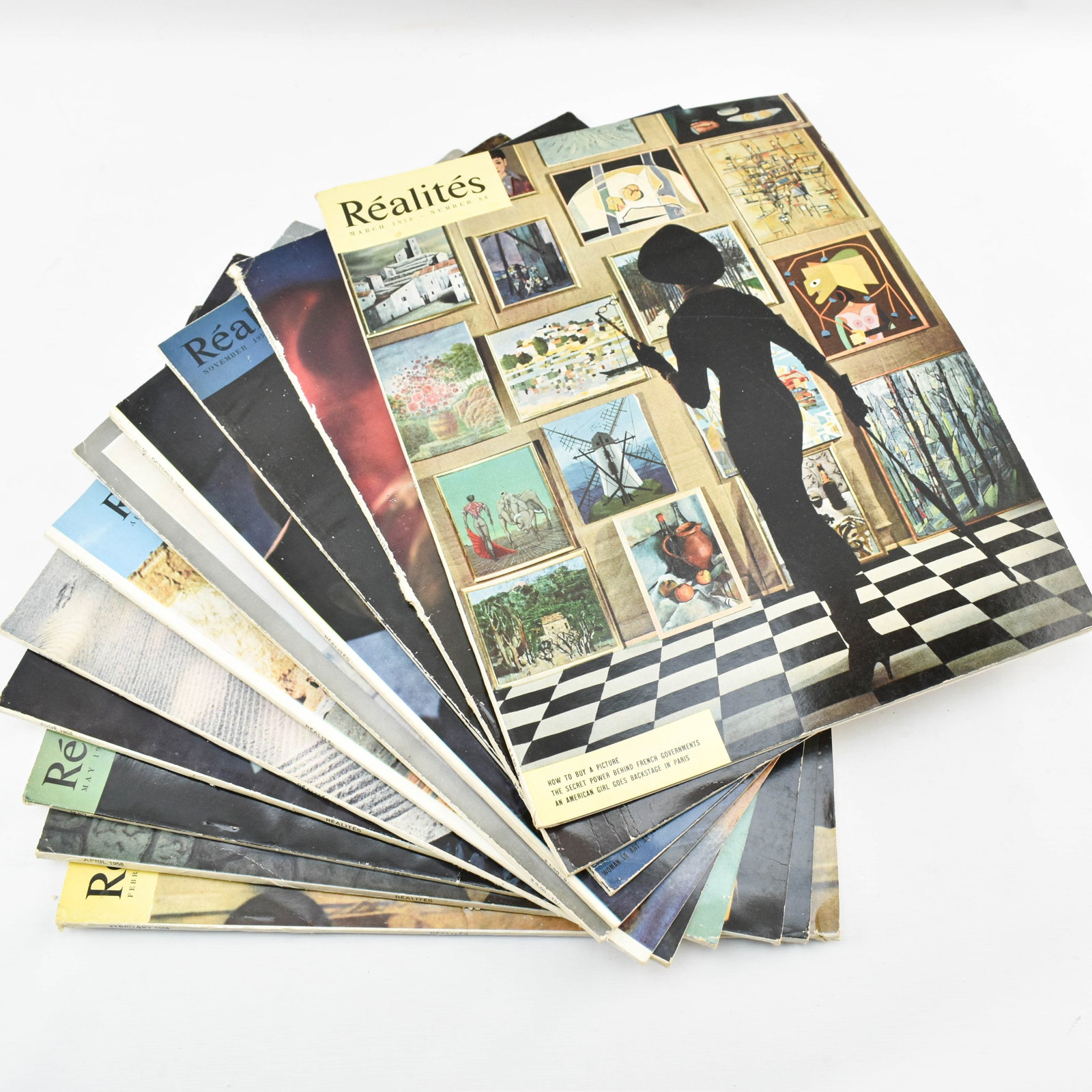 11 Vintage Issues of Realites Magazine, 1958: Issues 87 through 97 of the U.S. edition of French culture magazine Realites spanning February through December of 1958.