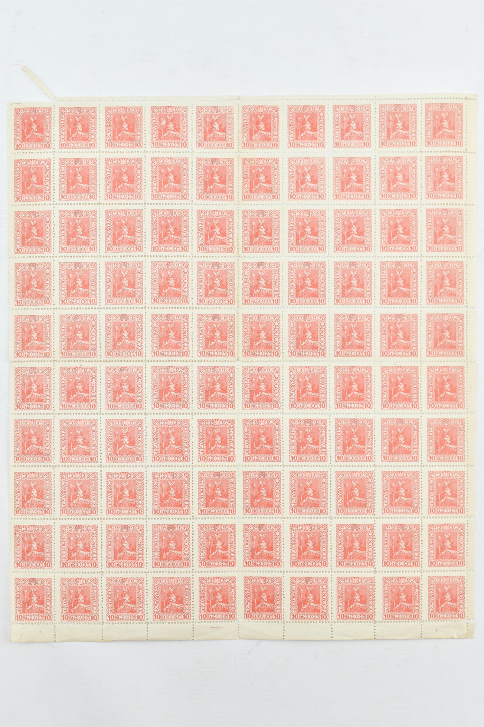 1920 Ukraine 10G Red Stamp Sheet: Lot includes a sheet of 10 stamps by 10 stamps. Sheet has been folded/hinged into quarters as pictured. All stamps sold as is.