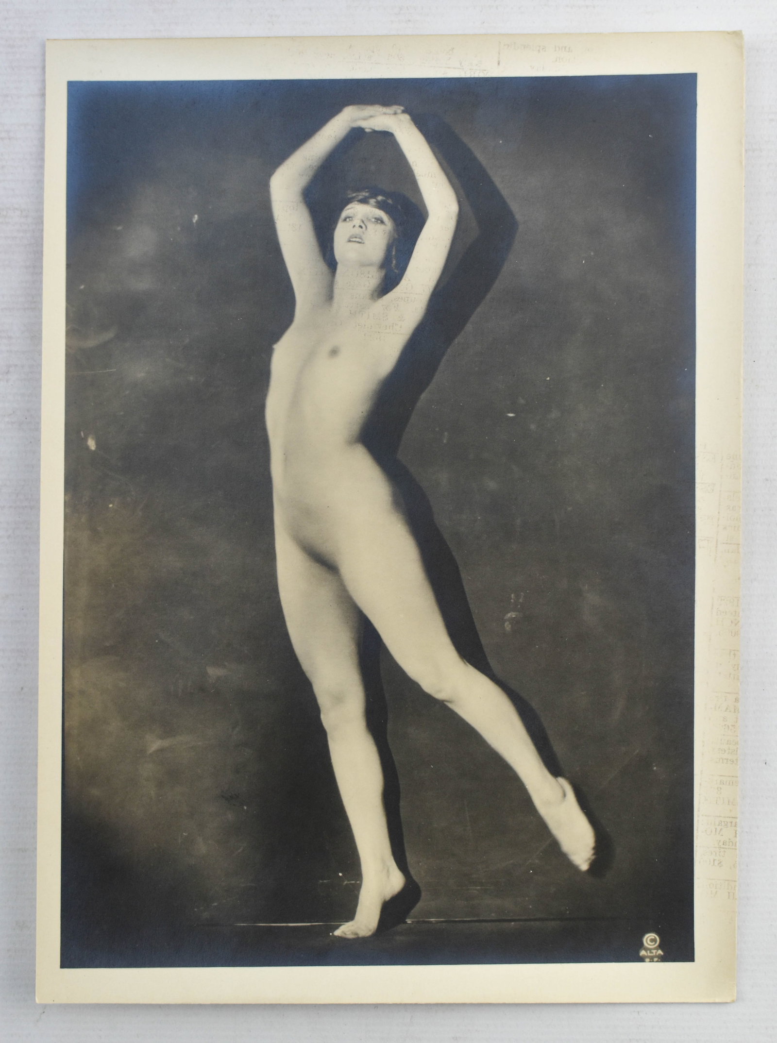 Vintage Boudoir Dancer Photo by Alta: 7 x 5 vintage boudoir photograph of a nude woman in a ballet pose published by Alta. Copyrighted in the lower right corner. Black and white.