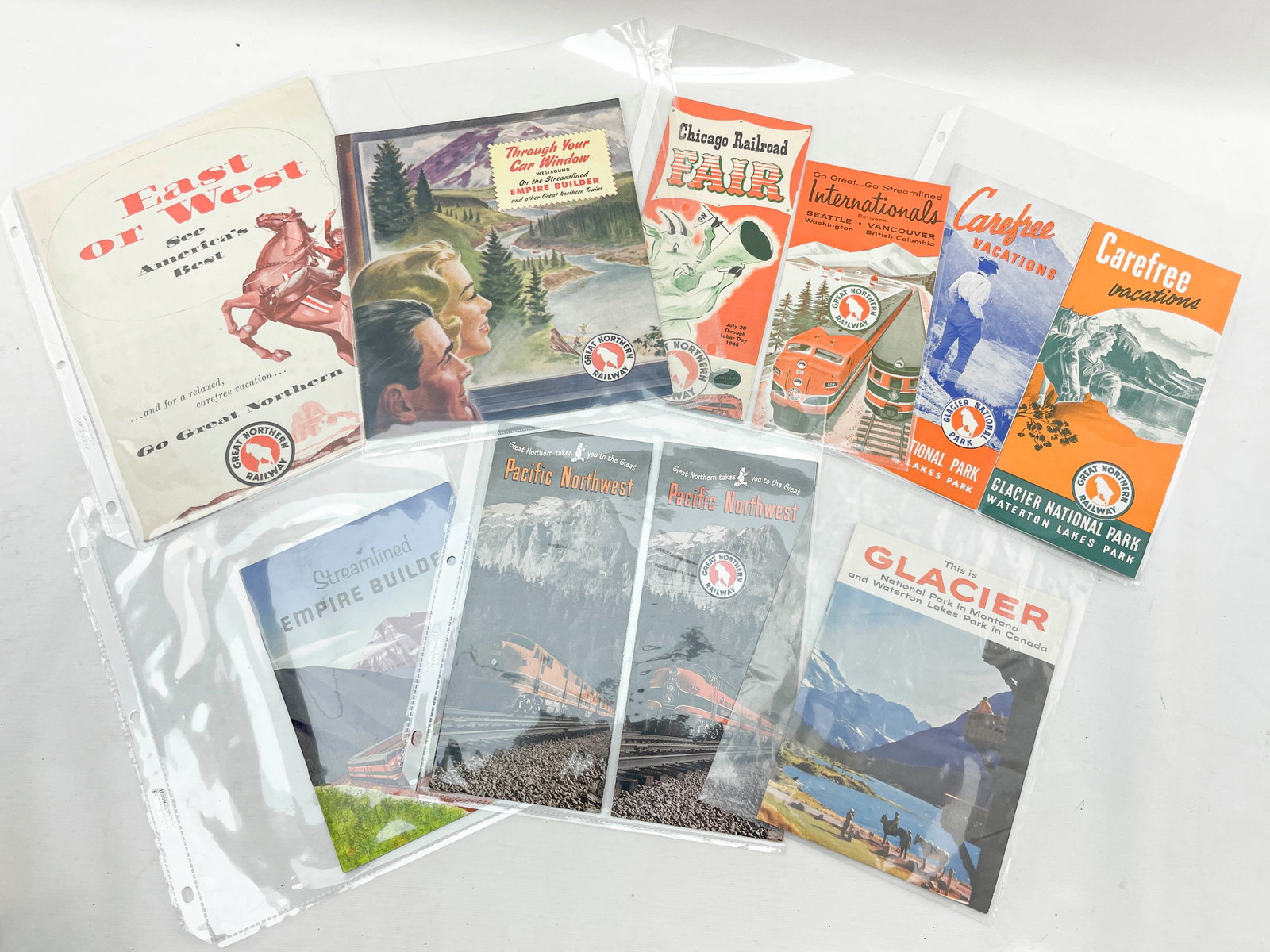 Grp 10 Great Northern Railway Vintage Travel Brochures: Group of ten vintage Great Northern Railway promotional tourist advertisements or travel brochures. Includes pamphlets from the mid-20th century for destinations and routes such as Glacier National Pa