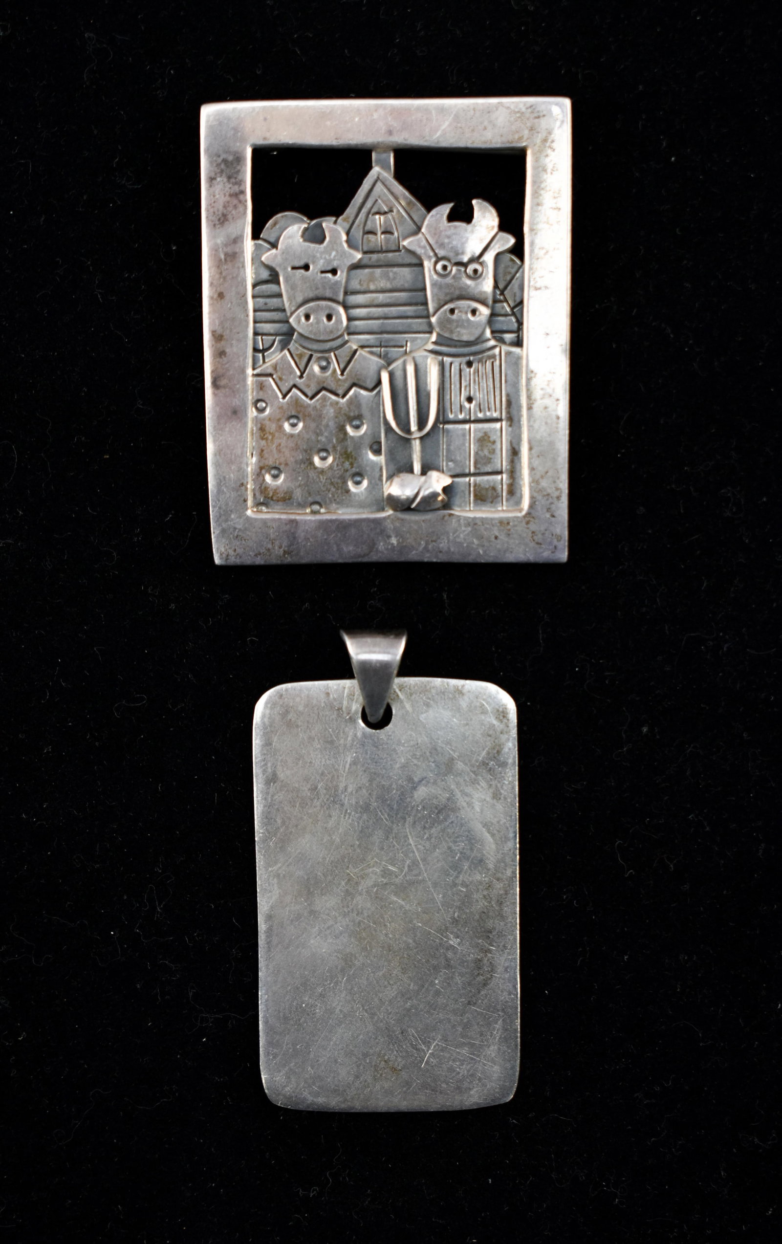 Sterling Silver American Gothic Brooch and Pendant: Includes a brooch featuring a comical rendering of Grant Wood's American Gothic with cows supplanting the people and a rectangular pendant. The former is marked 'Mexico, Far Fetched Sterling' on the v