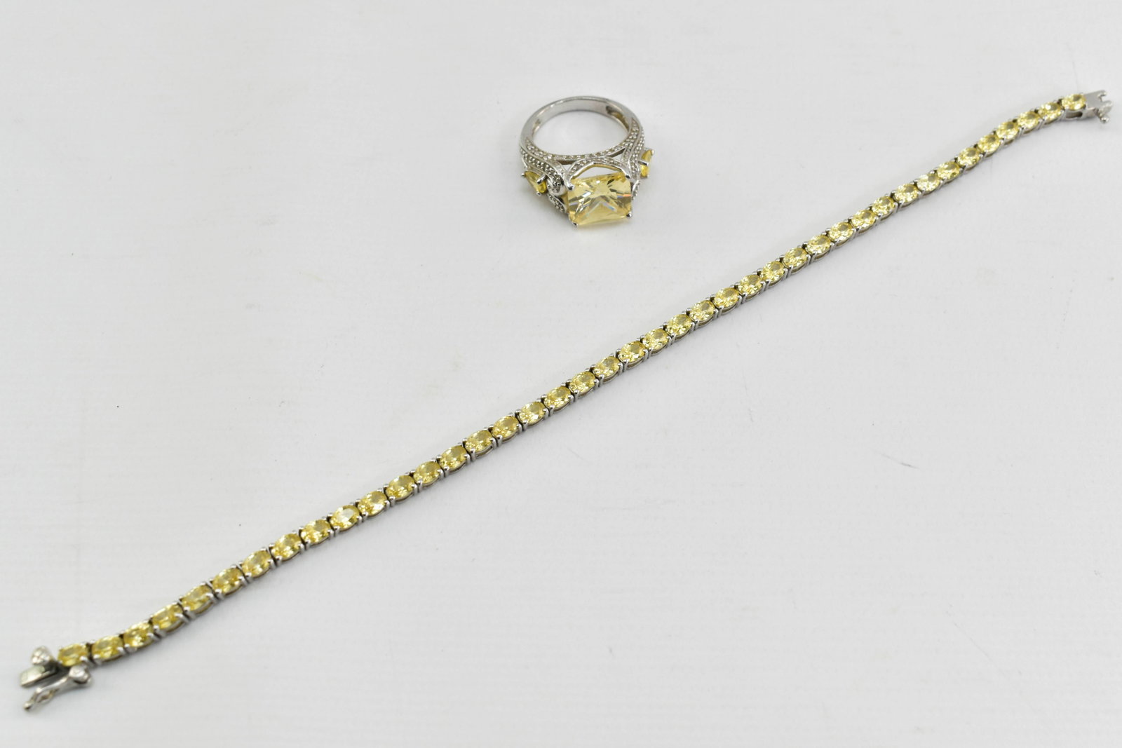 Sterling Silver Bracelet & Ring, Yellow: Includes 7.5" bracelet and ring (sz. 5), each set with yellow stones. Each marked 925.