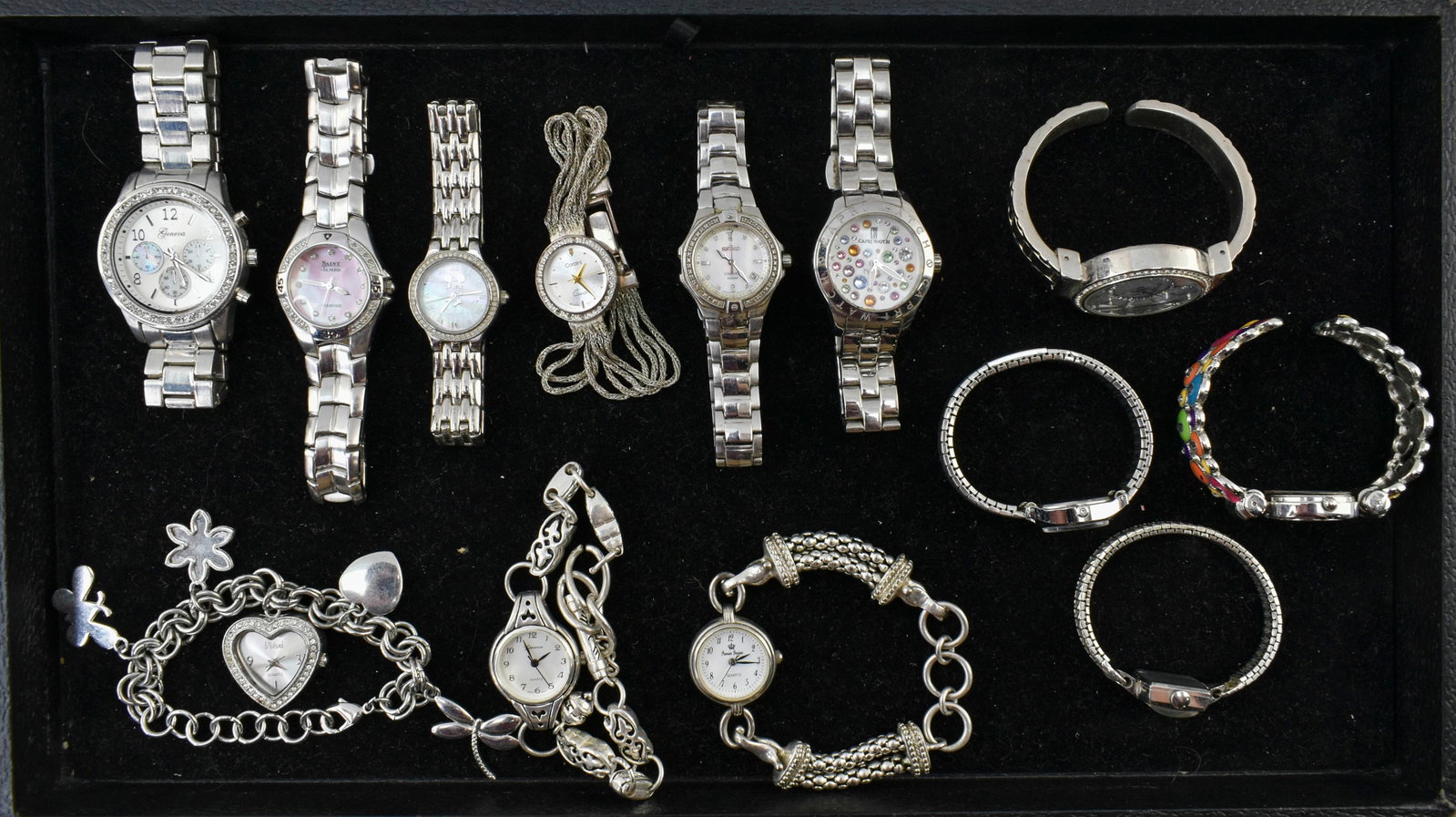 12 Ladies Silver-Tone Wrist Watches: Includes brands like Geneva, Seiko, Premier Designs, Saint James, and more. 7.5H x 1.25W