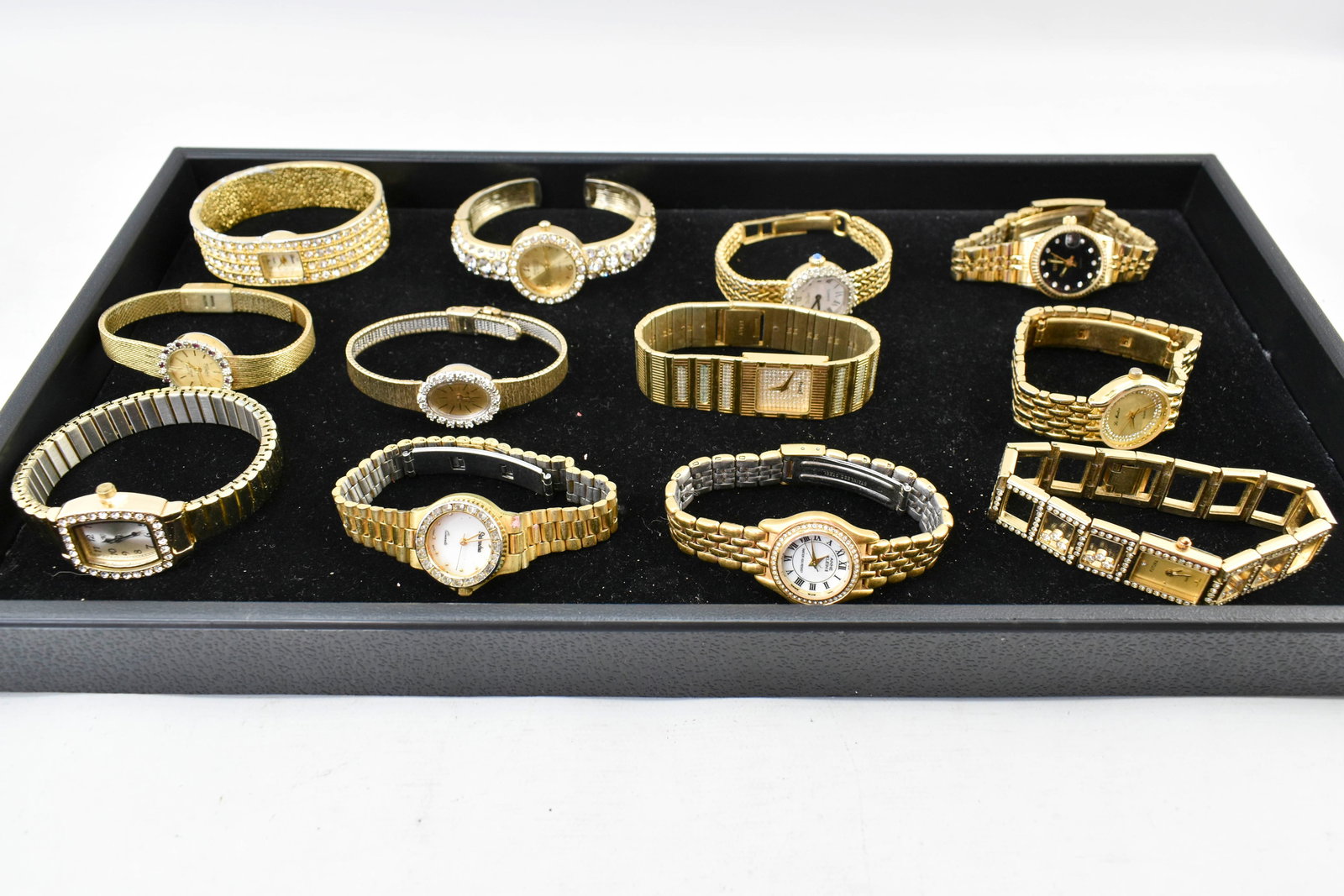 12 Gold-Tone Ladies Wrist Watches: Includes brands like Gruen, Anne Klein, Geneva, Futura, and more.2.5H x 2.5W