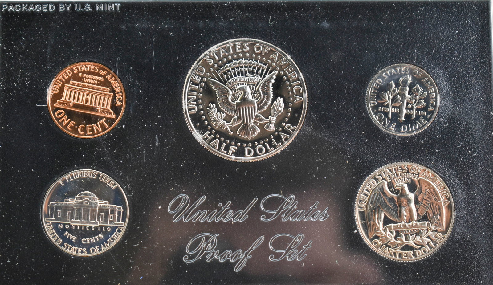 1972 U.S. Proof Set: 5 coin proof set in plastic case and cardstock sleeve. Set pictured is set you will receive. 3.5"H x 5.5"W x 0.5"D.
