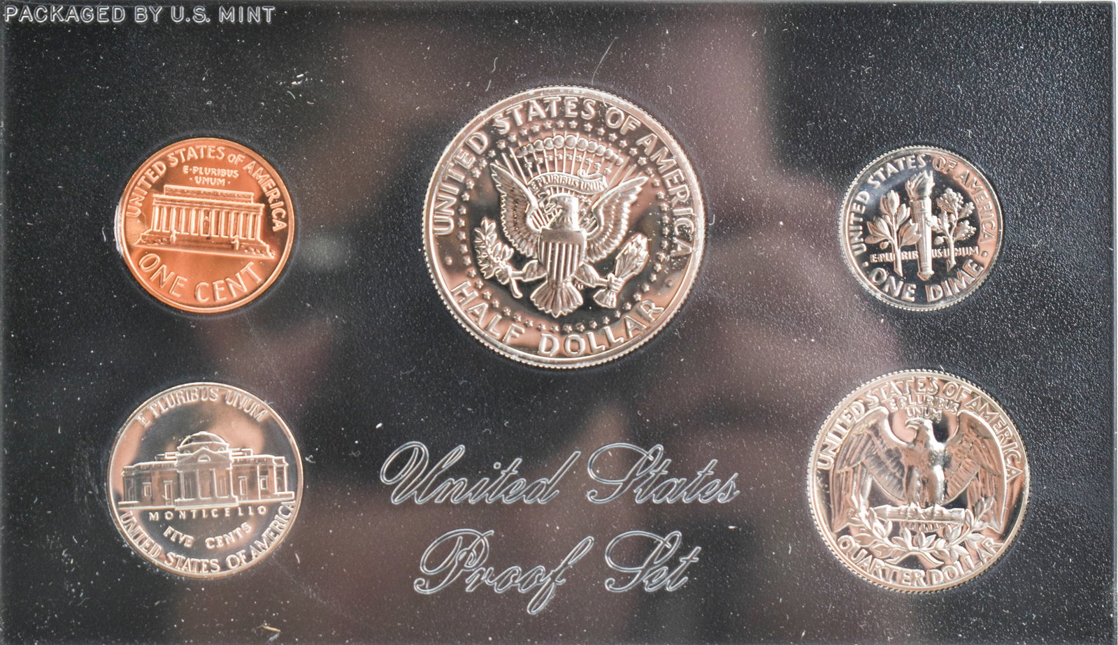 1972 U.S. Proof Set: 5 coin proof set in plastic case and cardstock sleeve. Set pictured is set you will receive. 3.5"H x 5.5"W x 0.5"D.