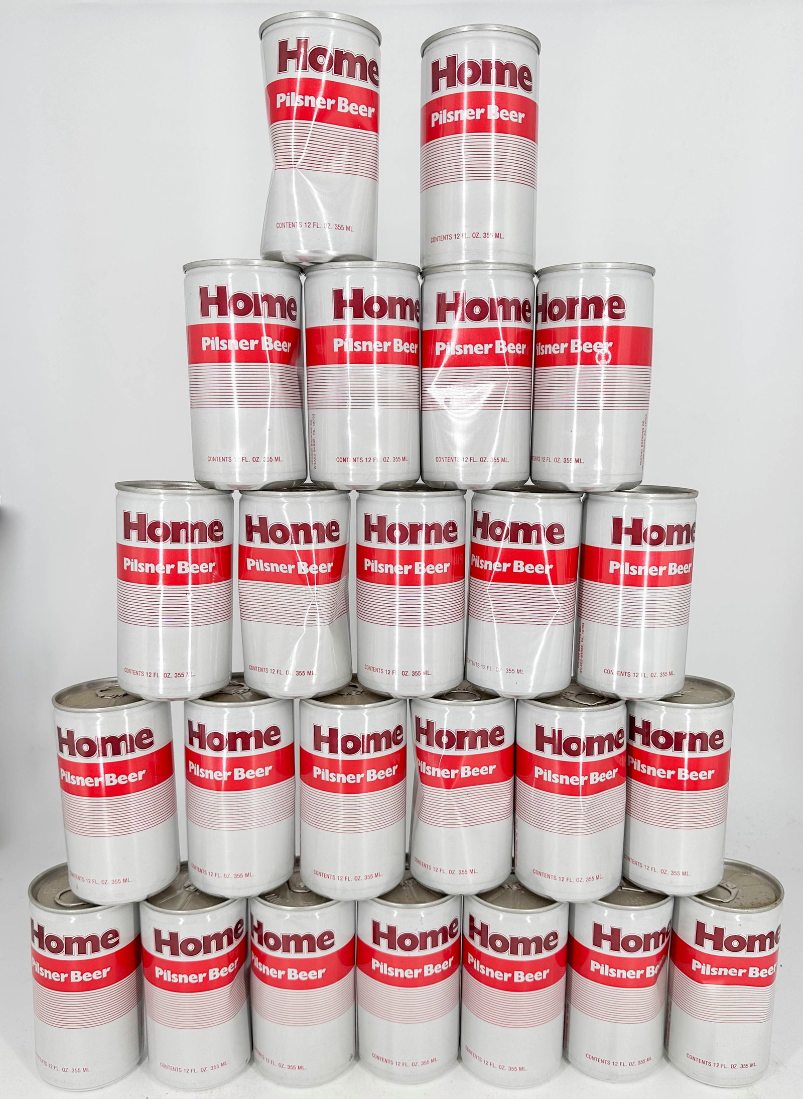 Assortment of 26 Home Pilsner Beer Vintage Beer Cans: Lot of 26 aluminum air filled vintage beer cans. This lot features exclusively Home Pilsner Beer cans. Styles include pull tabs.12 Fl Oz.