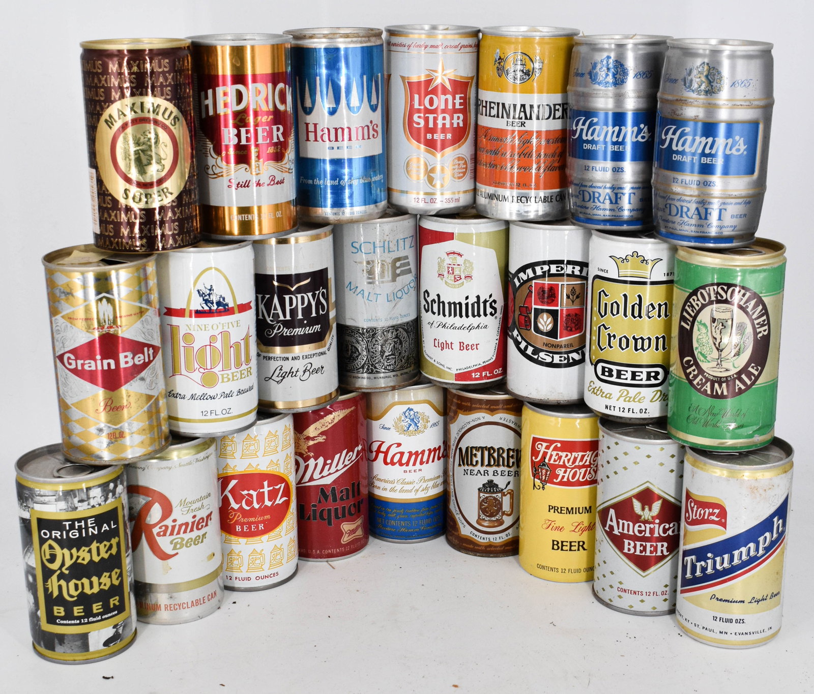 Assortment of 24 Vintage Beer Cans from Brands Including Maximus Super, Hendrick Beer, Hamm's, Lone : Lot of 24 aluminum and steel top and bottom opened vintage beer cans. This lot features brands including Maximus Super Beer, Hendrick Beer, Hamm's Beer, Lone Star Beer, Rhinelander Beer, Grain Belt Be