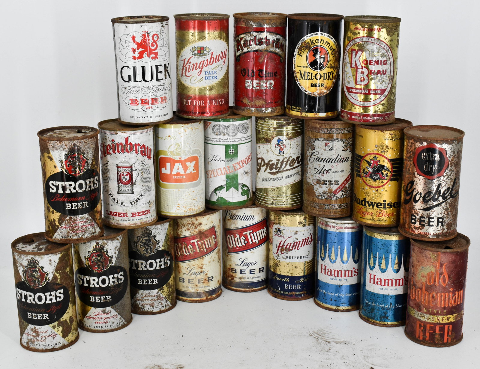 Assortment of 22 Vintage Beer Cans from Brands Including Gluek, Kingsbury Pale Beer, Karlsbrau Old T: Lot of 22 steel top and bottom opened vintage beer cans. This lot features brands including Gluek Pilsner Beer, Kingsbury Pale Beer, Karlsbrau Old Time Beer, Frankenmuth Mel-O-Dry, Koenig Brau Beer, S