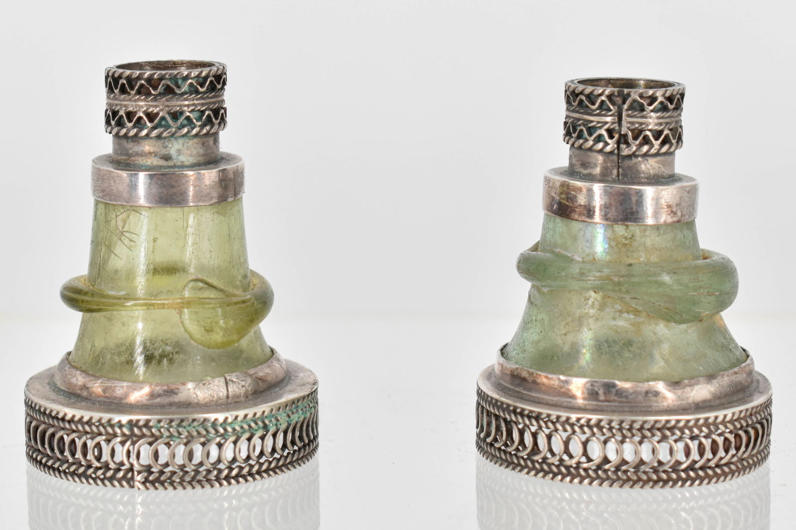 Pair of Miniature Israeli Candlesticks, Sterling Silver and Roman Glass: Each marked on the underside.Each: 1 3/4"H x 1 1/4"Dia