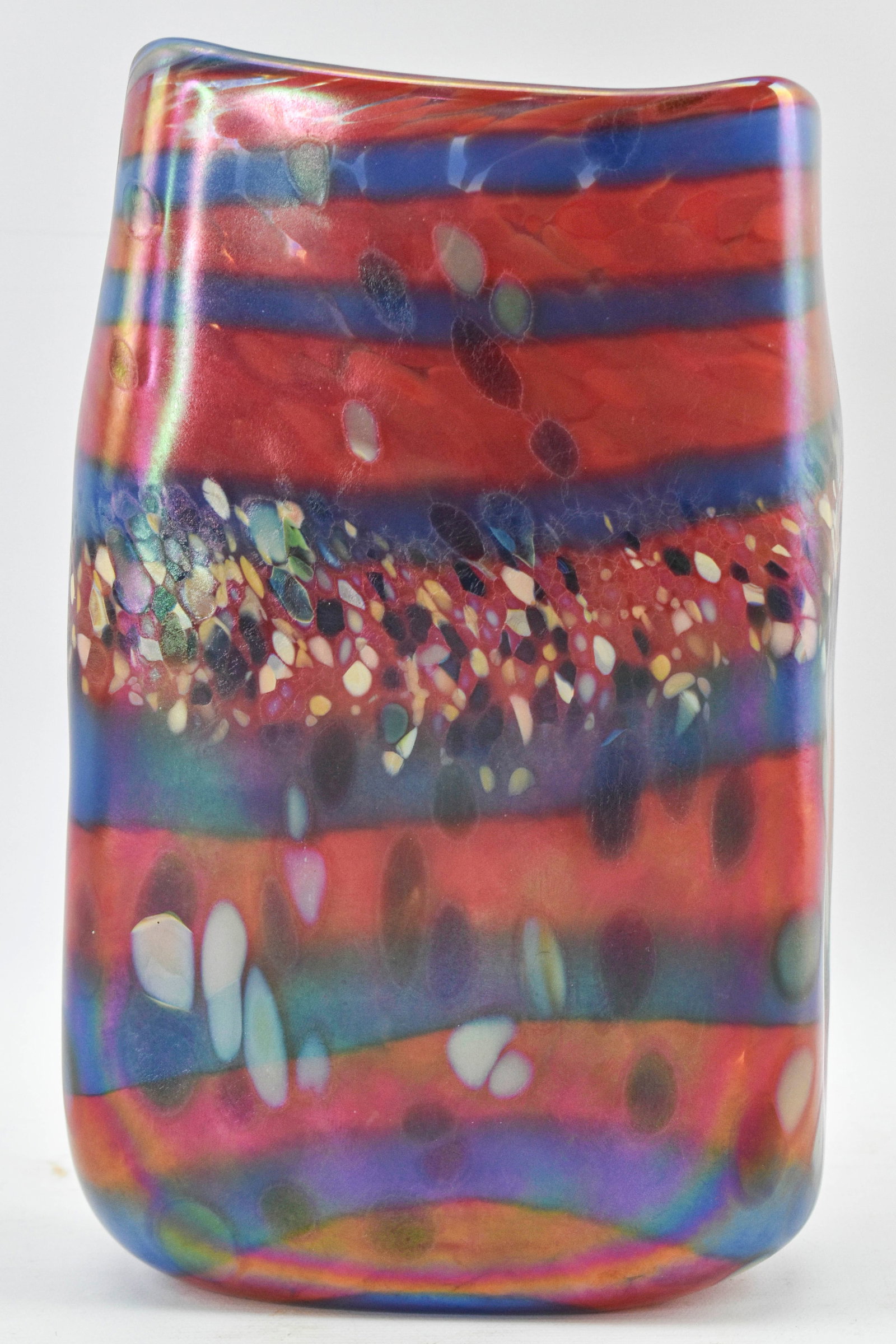 Steve Palmer Iridescent Art Glass Vase: Signed art glass vase by Steve Palmer with iridescent finish and colorful striped design. Signed and dated on underside. 8"H x 5"W x 2.25"L