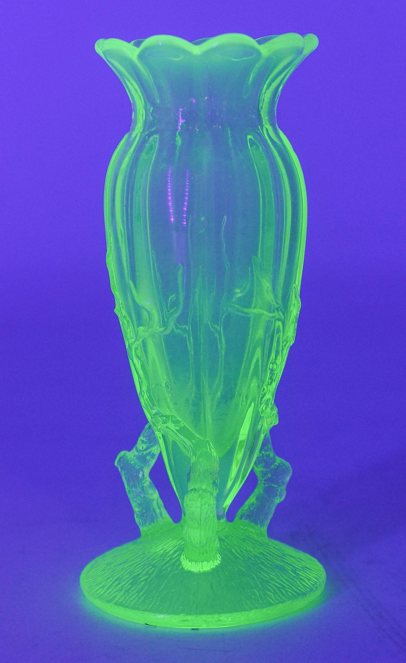 Small Opalescent Vaseline Glass Vase: Pressed uranium glass vase with relief branch decoration, unmarked. 4 3/4"H x 2 1/4"Dia