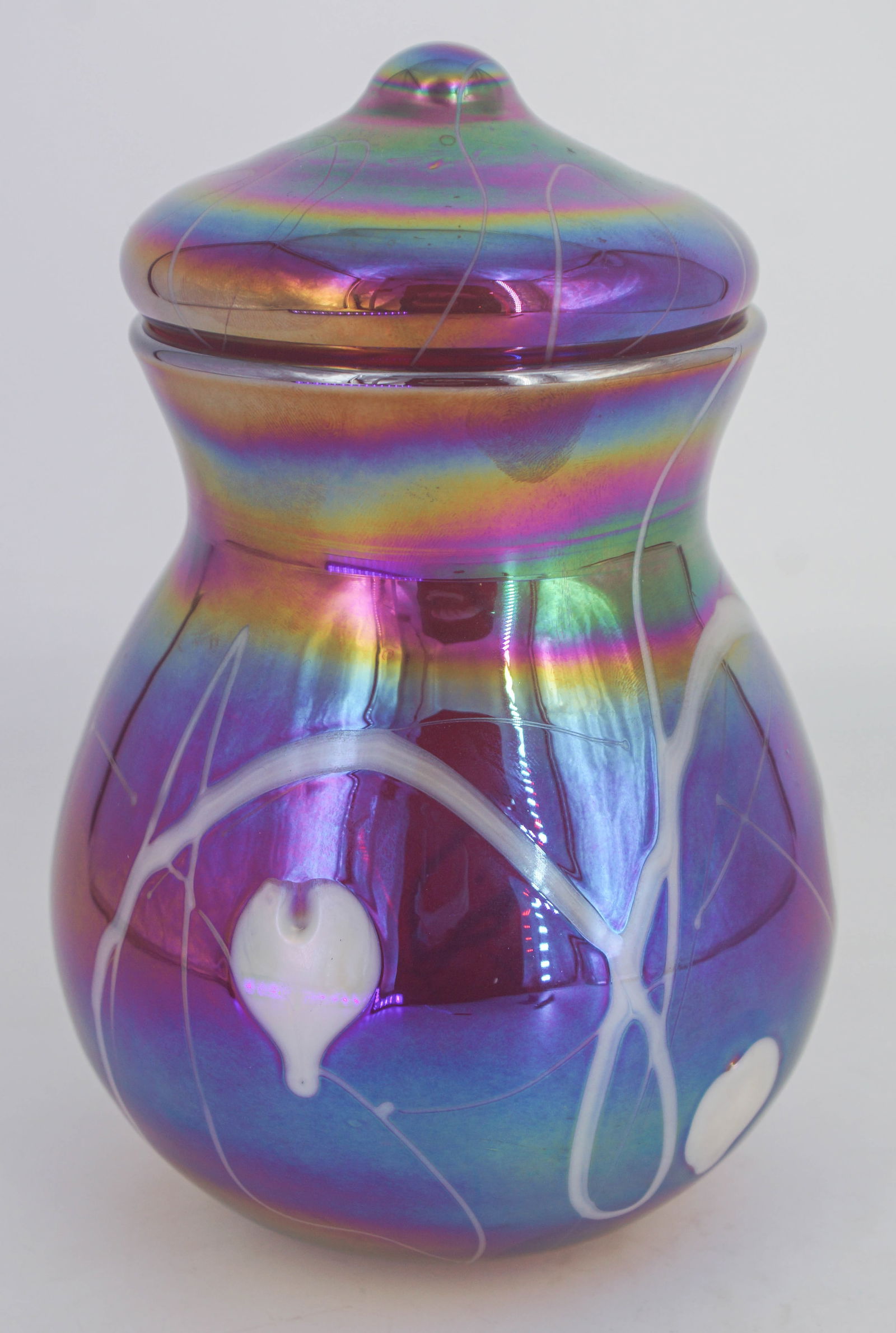Gibson Glass Lidded Iridescent Jar: Signed Gibson glass lidded jar with iridescent patterning, marked on the underside.7"H x 3 3/4"Dia (rim)