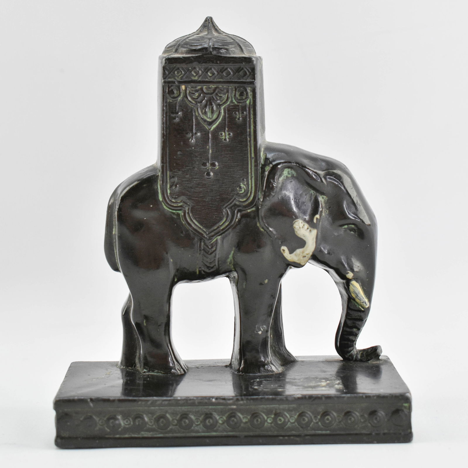 L.V. Aronson Iron Elephant Figure or Bookend: Metal elephant migure on base marked L.V. Aronson on the back of the base.4.5"H x 3.75"W x 2"L.