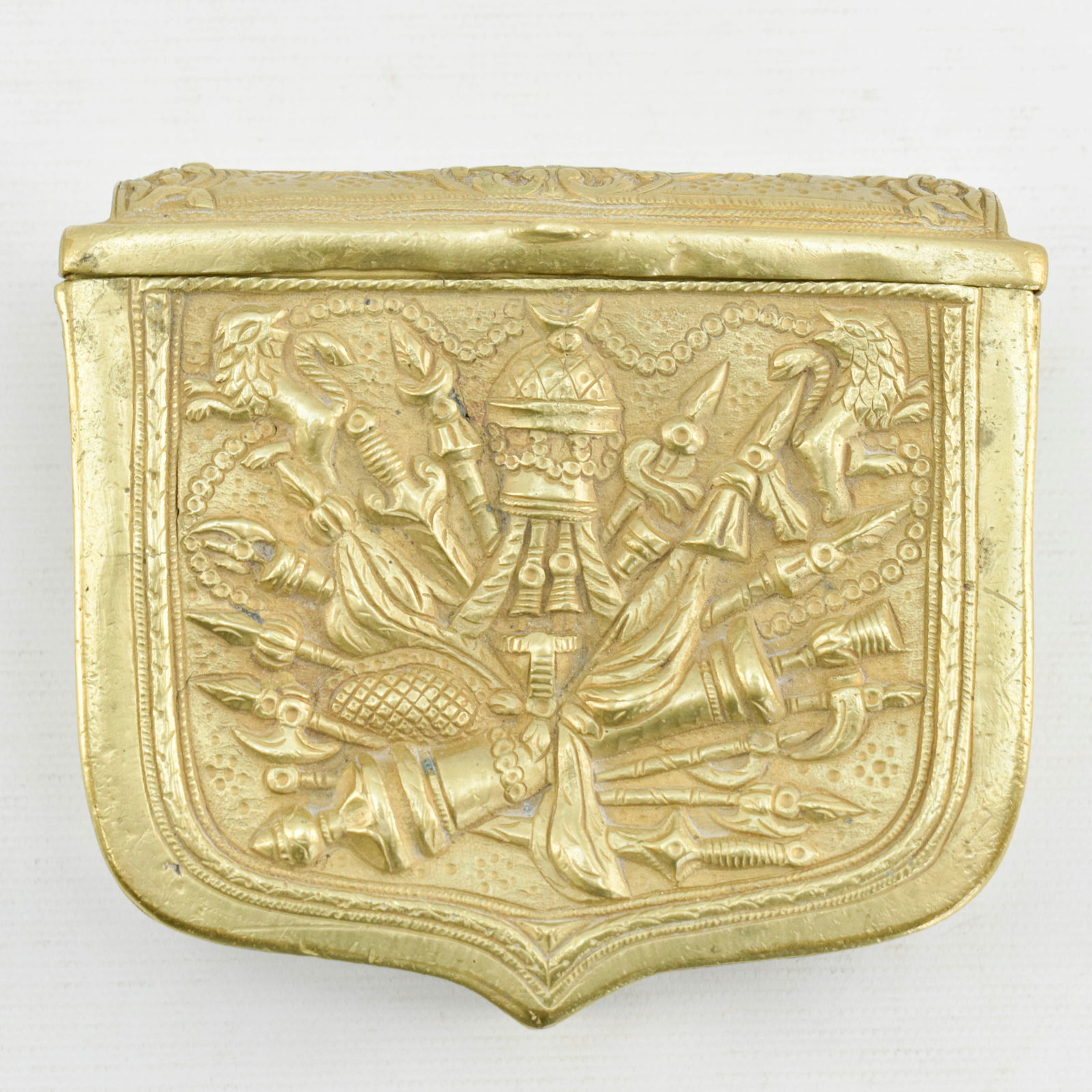 Antique Brass Palaska Ammunition Box: European or Central Asian antique brass cartridge box with belt loop on back side.4 1/2"H x 4 3/4"W x 1 1/2"D.