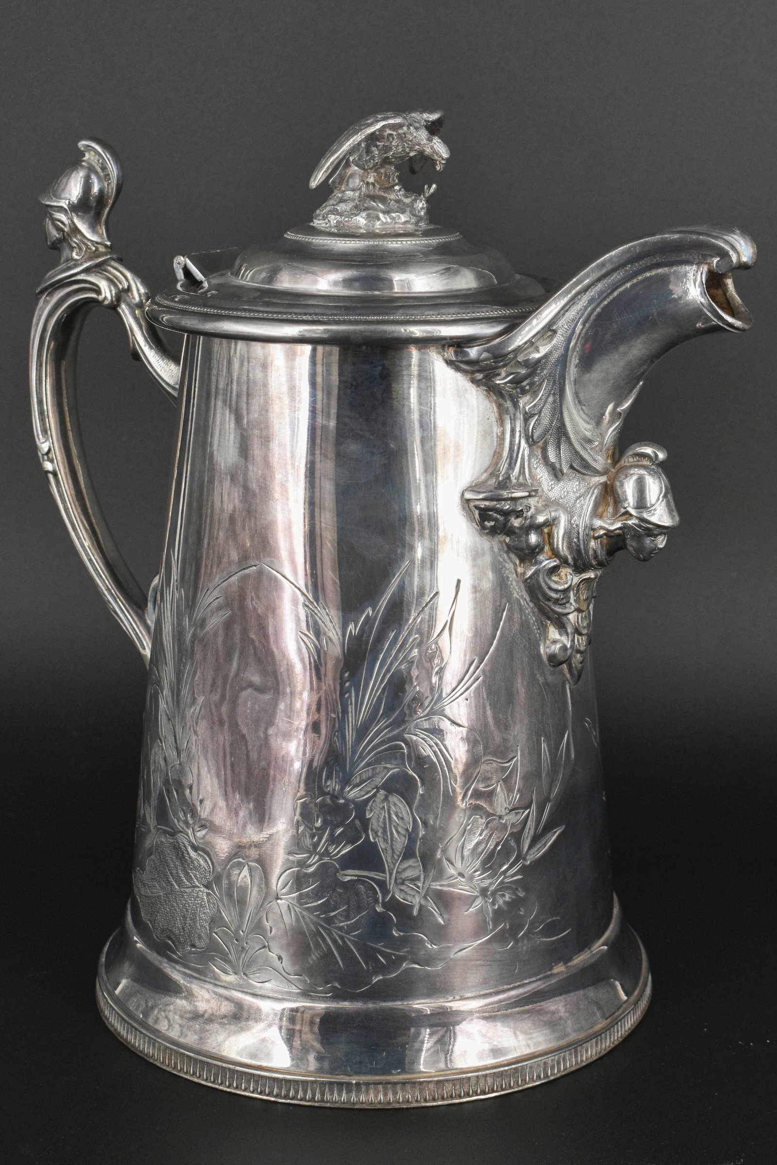 Large Ice-Water Pitcher: Possibly silver plate, marked "506" on the underside. 11 1/2"H x 7 1/2"Dia (base)