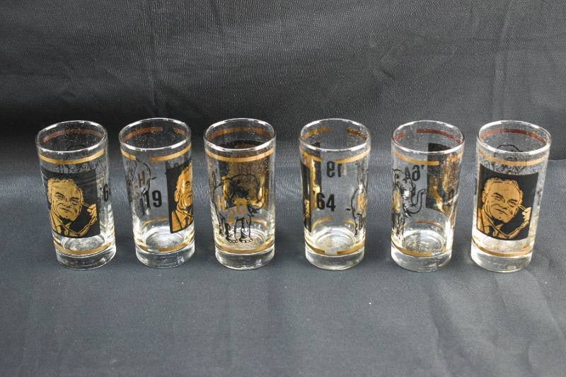 6 Barry Goldwater Black & Gold Tumbler Glasses: Set of six tumbler glasses with a black & gold portrait of Republican Presidential Candidate Barry Goldwater decorating one side of the glass with 19 and 64 on either side of him. On the other side of