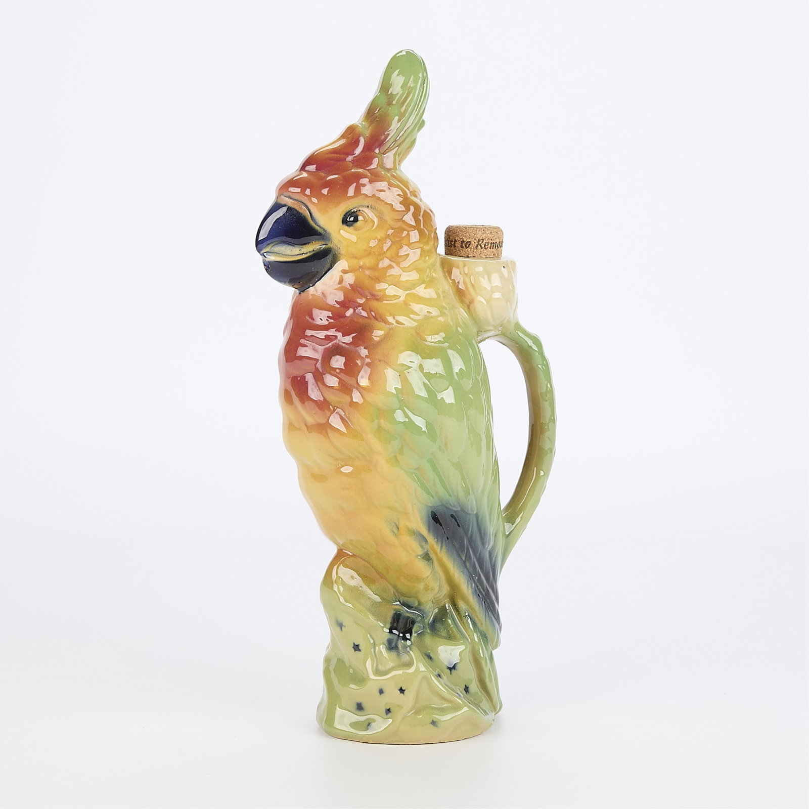 St. Clement French Art Pottery Cockatoo Pitcher: Antique French St. Clement art pottery majolica or maiolica pitcher in the form of a cockatoo, 20th century. Marked #468 with the St. Clement maker's mark. 13?H x 6"W x 3"D