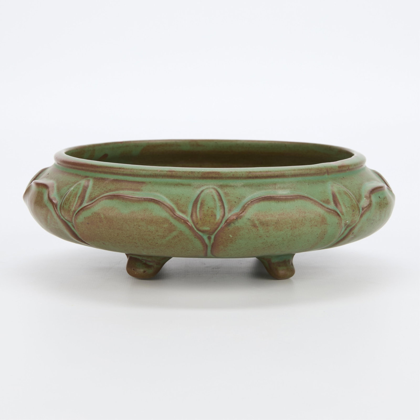 Vtg Weller Art Pottery Orris Bowl Planter 1915: Vintage Weller Art Pottery "Orris" bowl planter resting atop four feet, 1915. With incised foliate motifs and a matte green and brown glaze. 3"H x 9"D
