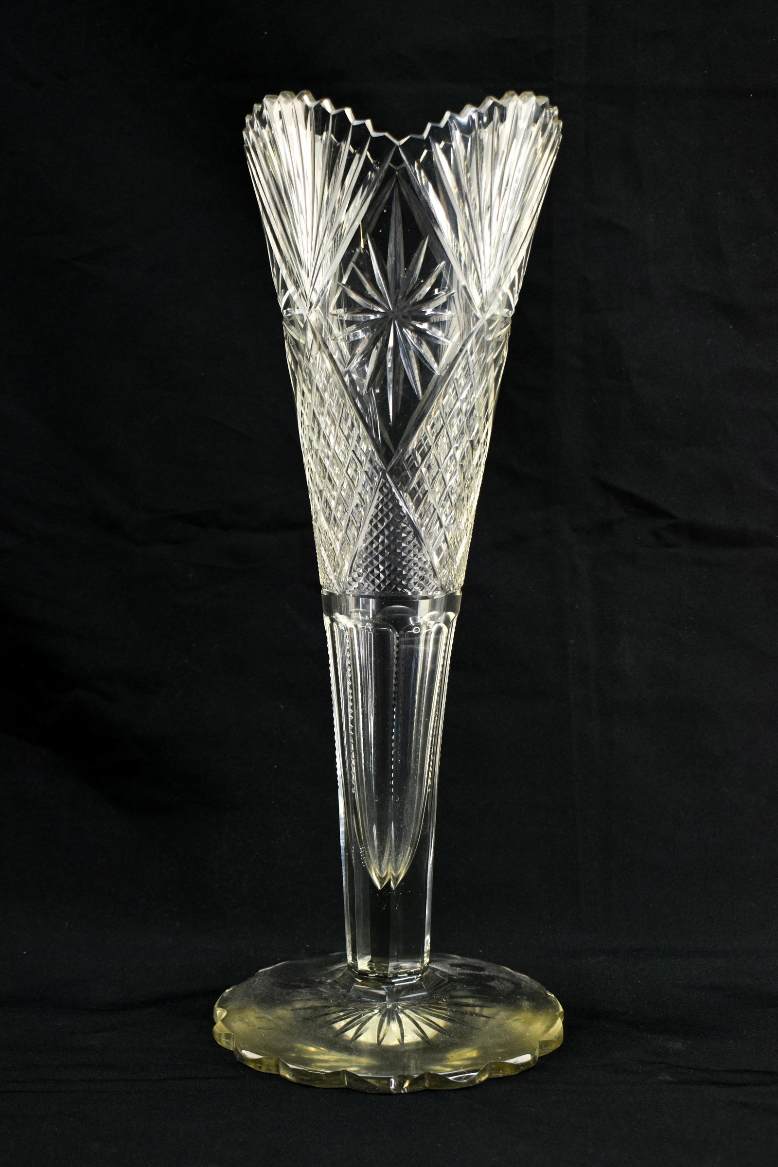 Antique American Billiant Cut Glass Vase: 16.75" high Ameircan Brillian cut glass vessel with starburst design.16.75"H x 6.5"Dia.