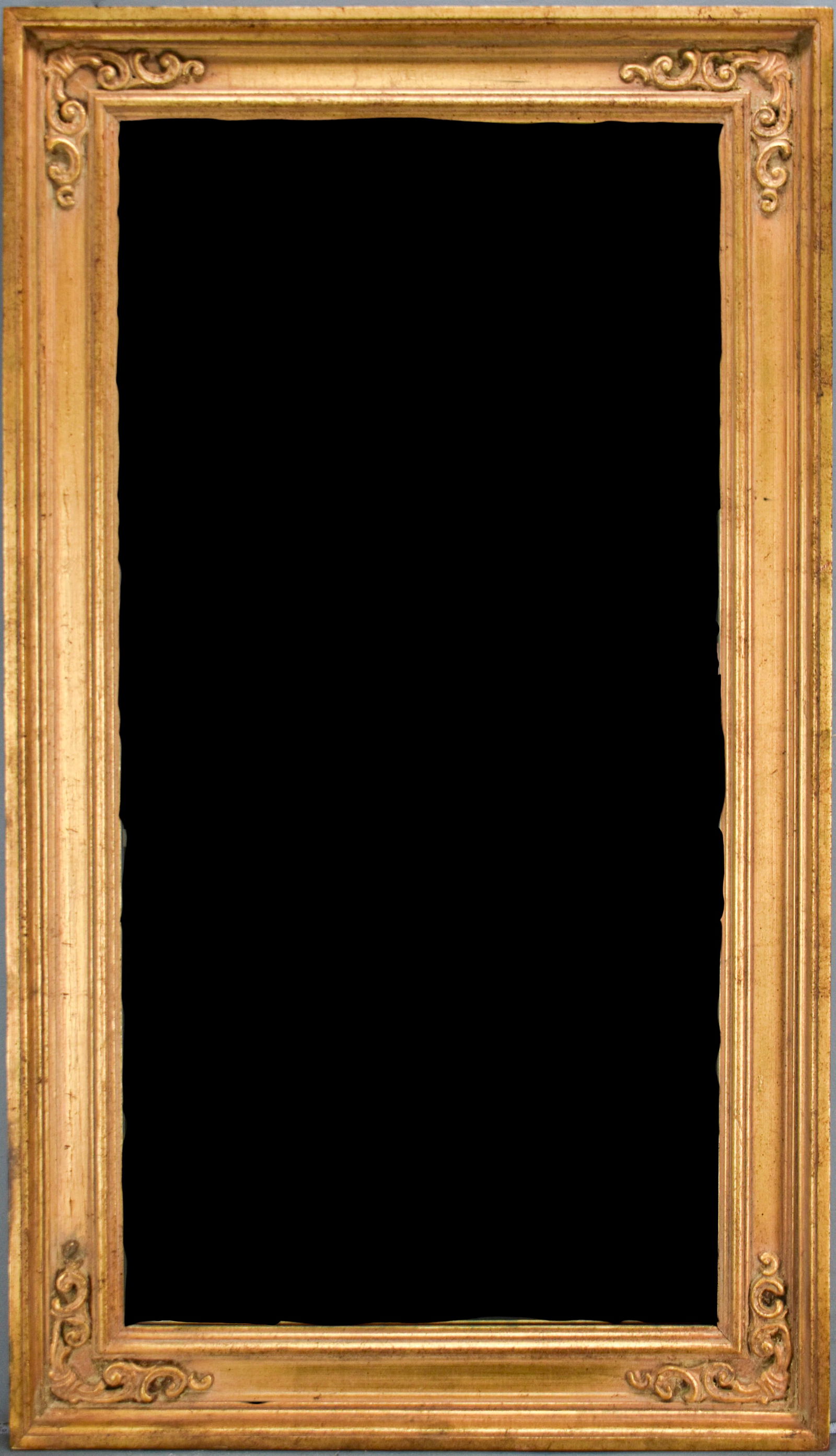 Rectangular Gilt Wood Mirror: Wood framed mirror finished with gold paint. Beveled edge. Donelle Inc., Los Angeles, California label on back.41.75"H x 23.75"W.