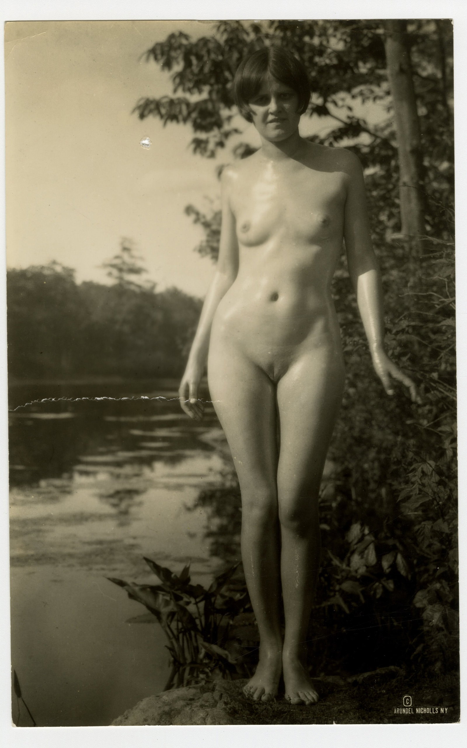 Vintage 1920s Erotic Photograph Arundel Holmes Nicholls Nude In Nature: This is a vintage and original erotic photograph taken by photographer Arundel Holmes Nicholls of a nude woman in the woods. This was possibly taken for his 1923 book "Woodland Romance." Pho