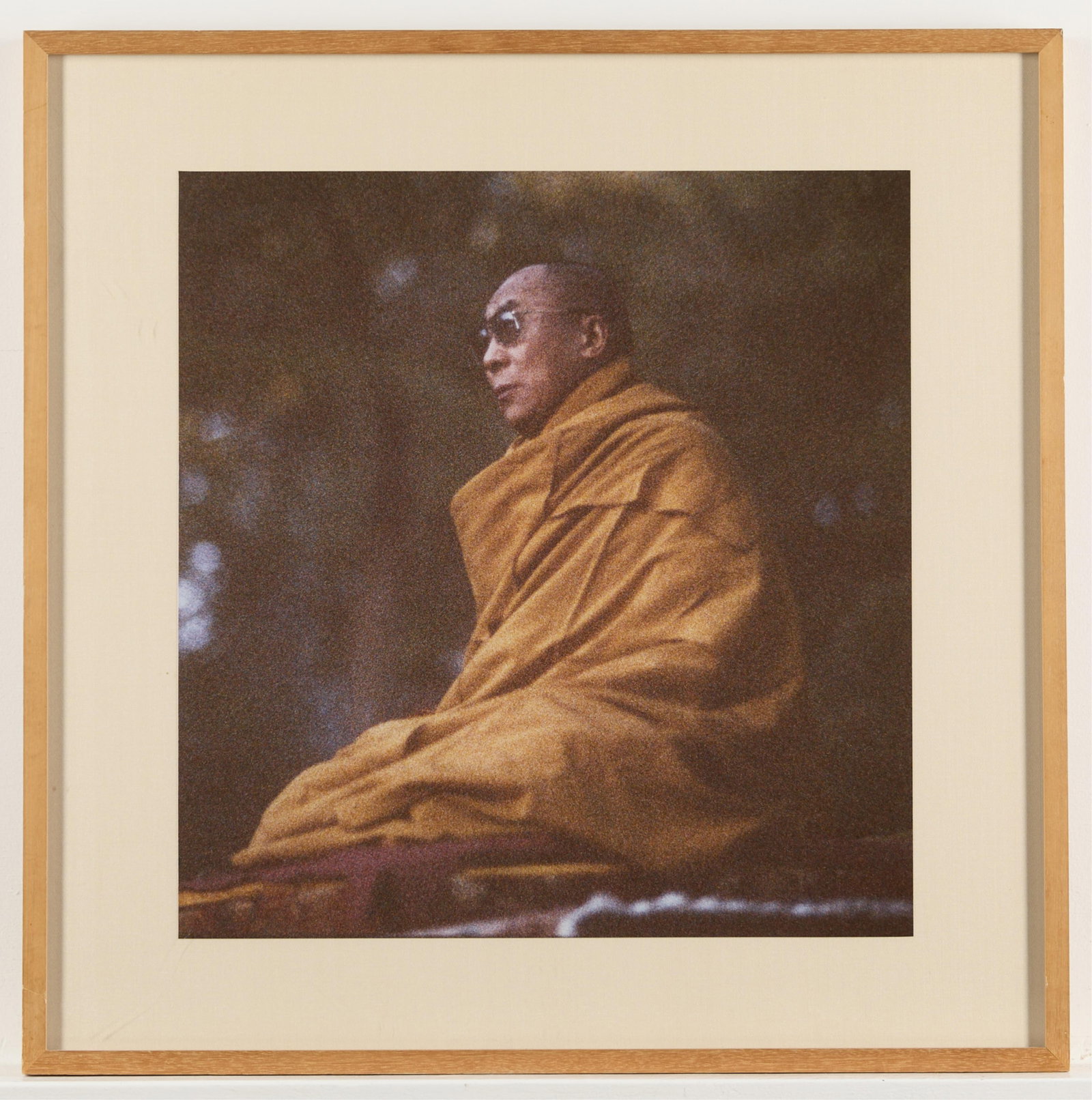 Dali Lama Photograph by John Bigelow Taylor: Framed and matted photograph of the Dali Lama during an appearance in Central Park in 1991. Signed by the artist on label on back of frame. 26.25"H x 26.25"W.