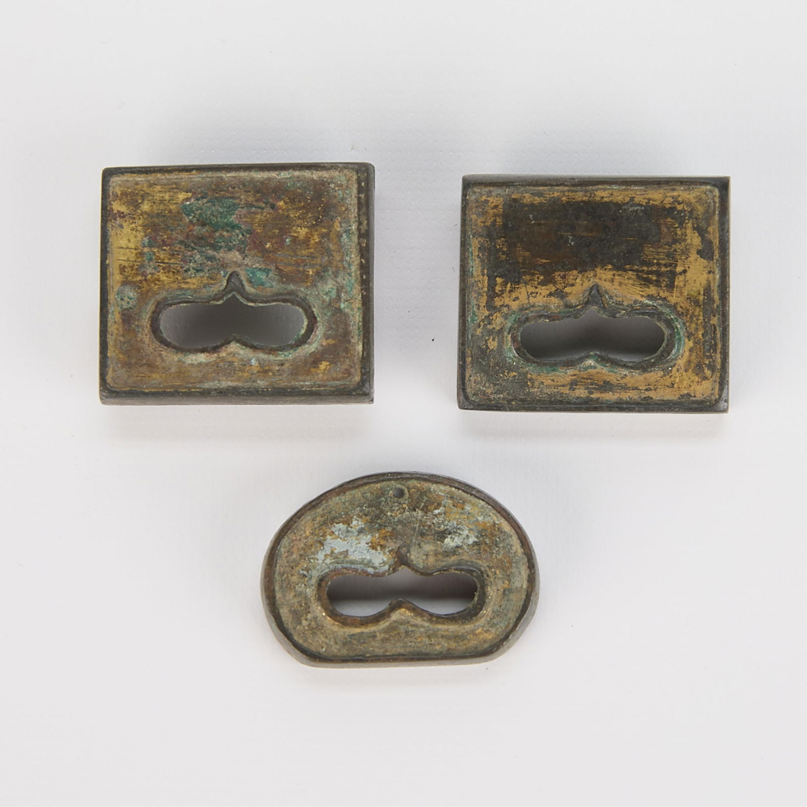 3 Chinese Gilt Bronze Belt Fittings: Lot includes 3 vintage or antique bronze belt fittings. Fittings have traces of gilt finish, though the finish is worn.Rectangular fittings: 1.25" x 1.75"
