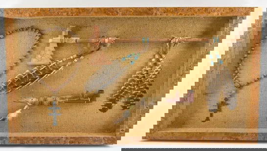 Framed Native American Artifacts: Necklace, Pipe, and Pipestone: Shadowbox frame containing a beaded red glass and wood necklace with double cross pendant, a pipe tomahawk with carved floral decoration and beaded elements, and a stone blade pipe with carved priest