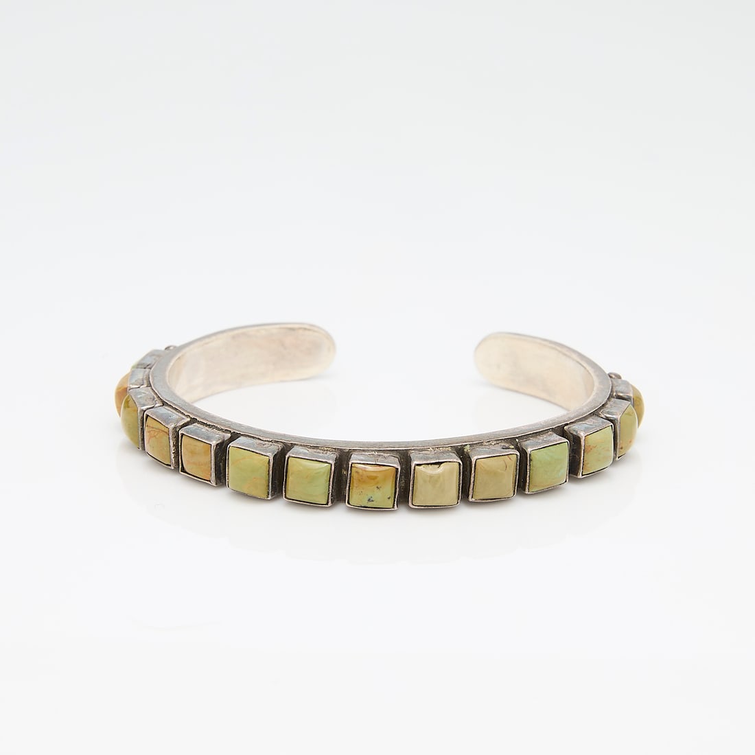 Sterling Cuff Bracelet, Marked DMD: One sterling cuff marked DMD set with hard stones.Gross weight: Approximately 35g