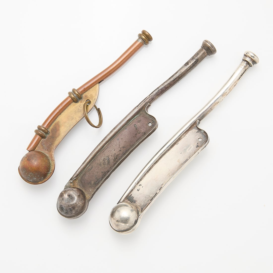 3 Boatswain Bosun Whistles, 2 Sterling: Vintage or antique Boatswain whistles, 2 sterling and one brass/copper or similar. The non-sterling whistle is marked Made in England.Gross weight of sterling whistles: Approximately 47gLargest: 5.5&q