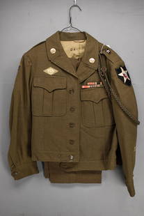WWII Era U.S. Army Wool Uniform: WW II Era U.S. Army wool uniform. Includes a field jacket and matching green trousers, service medal ribbons and unit insignia. Comes in a garment bag.