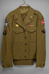 WWII Era U.S. Army Wool Uniform: WWII Era U.S. Army wool uniform. Includes a field jacket and matching green trousers, service medal ribbons and unit insignia.