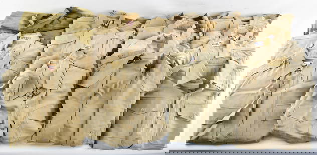 14 Asst. Military Uniform Shirts: Includes 4 with insignia as shown (hangers not included), 1 wool shirt, likely from the WWII era, and 9 other plain shirts, mostly khaki. Variety of shades and materials.