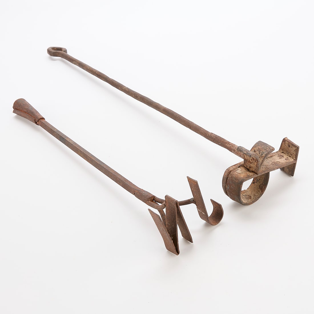 Two Wrought Iron Southwest Cattle Brands: Two wrought iron Southwest style cattle or sheep brands. One with "JN" and the other with a pictorial "P".LARGER: 25"L X 5"W X 3 1/2"H.