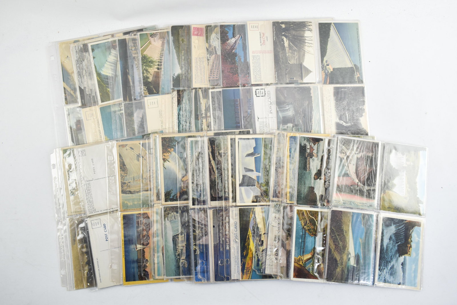 Postcard Collection - U.S. Dams & Hydroelectric with RPPCs: Loose binder pages with postcards from private collection. Mix of used and unused postcards.