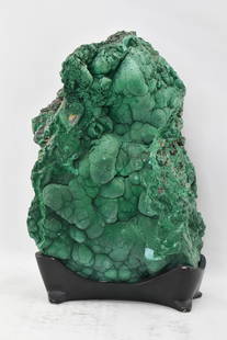 Tall Botryoidal Malachite Specimen: Display specimen on custom wood stand. Harvested in Democratic Republic of the Congo. Provenance: Bonham's Auction 27482: Fine Gems, Opals, Lapidary Arts and Natural History, May 17, 2022, Lot 3313; P