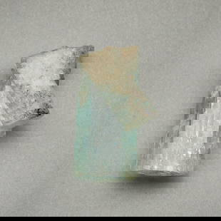 Small Blue-Green Crystal Rock Fragement Poss. Aquamarine: Small blue-green rock crystal or crystalline mineral segment. Possibly aquamarine, based on color and semitranslucent appearance.1.25"H x .5"Dia.