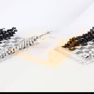 Onyx & Marble Chess Set with Board: Vintage carved onyx and marble chess set complete with all pieces and board. Board; height: 3/4 in x width: 14 3/4 in x depth: 14 3/4 in. Pieces range in height from 2 in to 4 in; width ranges from 1
