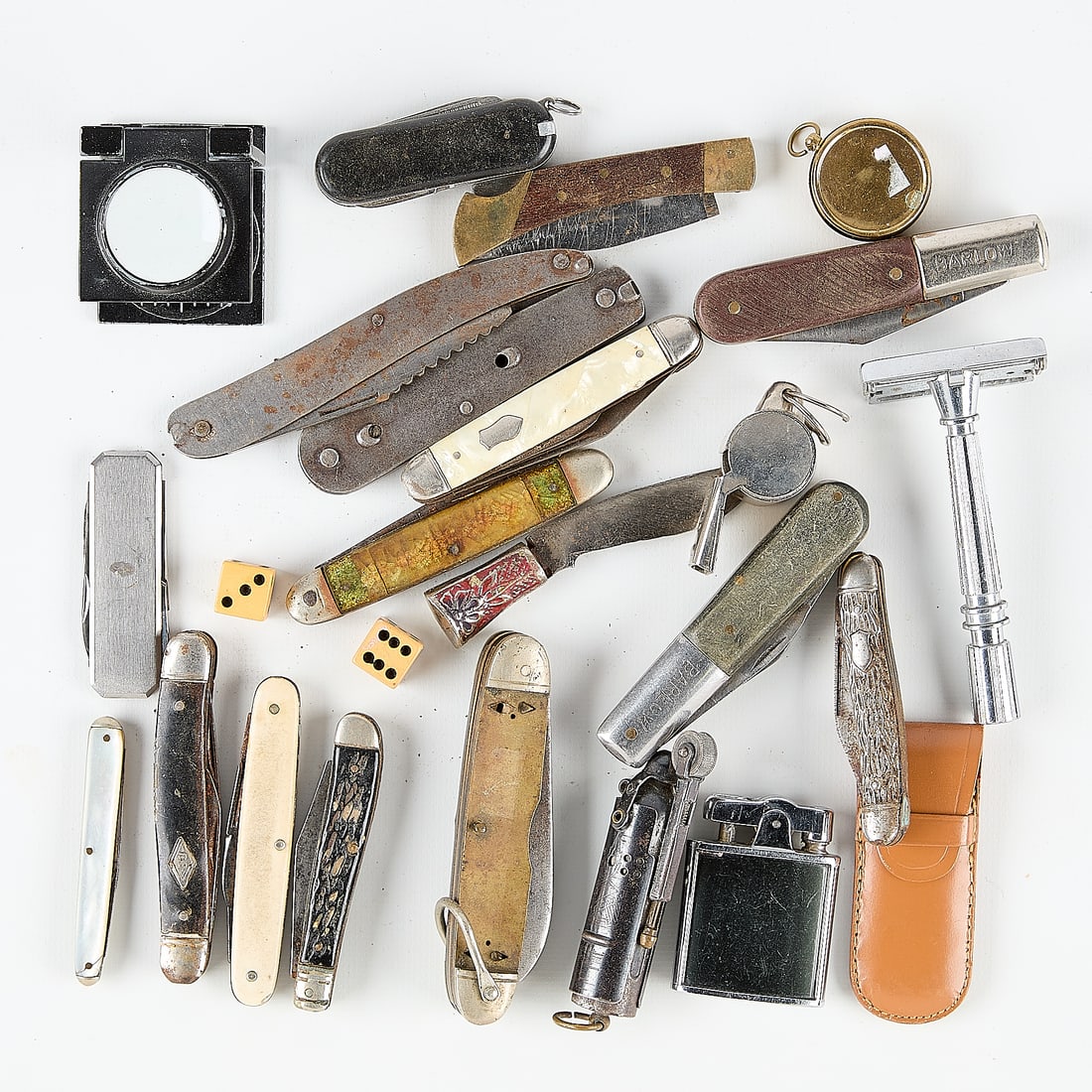 Group Antique Blades & More: Group of antique pocket knives, blades, razor, and other small ephemera. (Shipping dimensions) height: 4 1/2 in x width: 6 in x depth: 2 in.