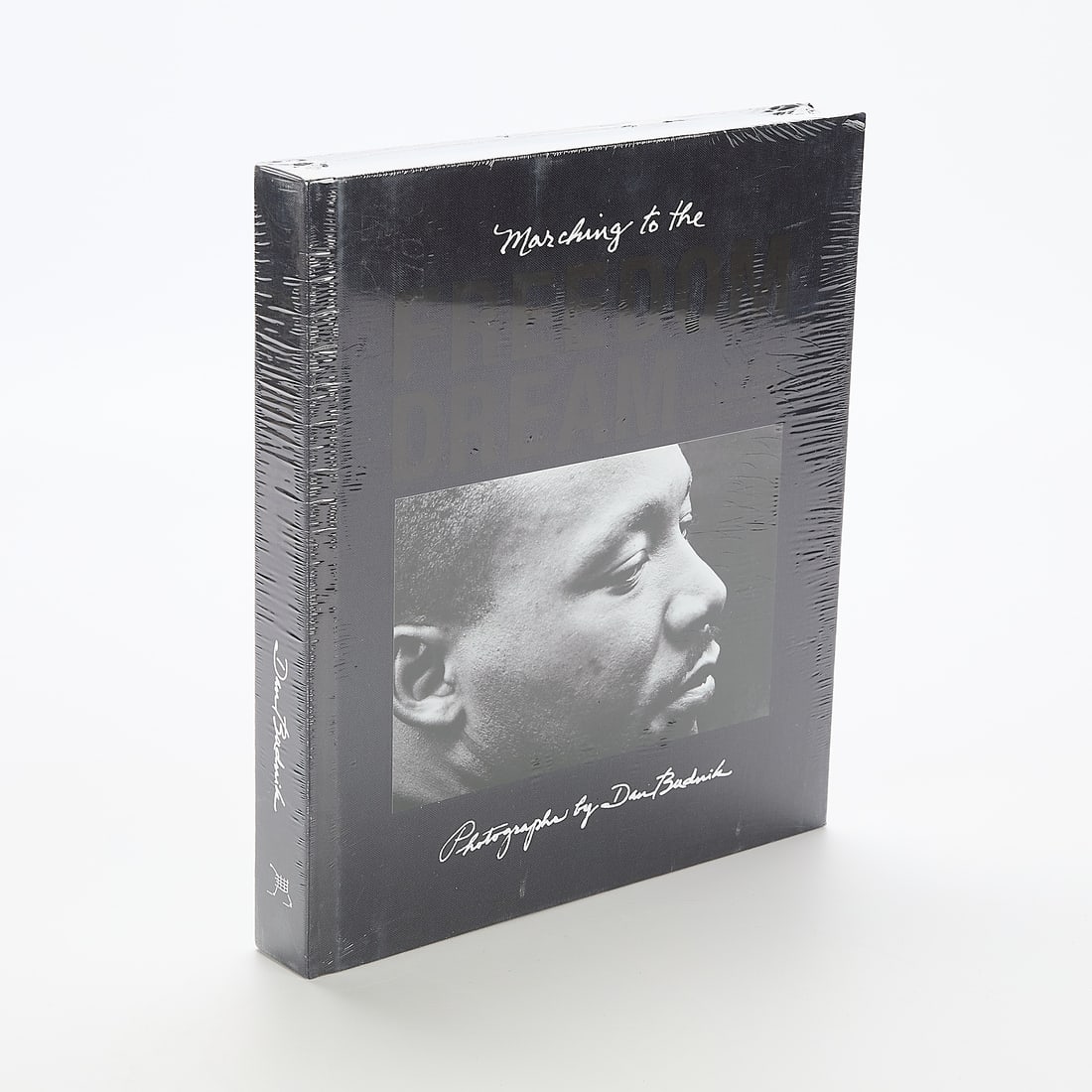 Dan Budnik "Marching to the Freedom Dream" Book, New: Collection of Dan Budnik’s color and black-and-white photographs documenting three seminal marches during the Civil Rights movement.11"H x 9.25"W