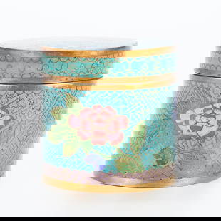 Antique Chinese Cloisonne Box: Antique Chinese cloisonne box with blooming flowers.Height: 3 1/4 in x diameter: 3 in.