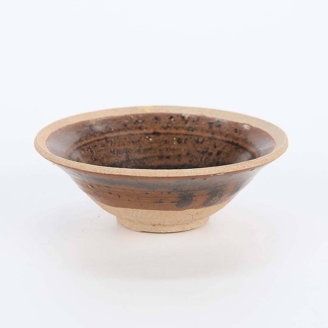 Chinese Song or Yuan Ceramic Bowl: Small Chinese Song or Yuan ceramic bowl. Brown glaze with unglazed upper and foot rim.Height: 1 1/2 in x diameter: 4 1/4 in.
