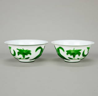 Pair Peking Glass Chinese Bowls: Pair of Chinese Peking glass bowls. White with green floral motifs.(Each) Height: 3 in x diameter: 7 in.