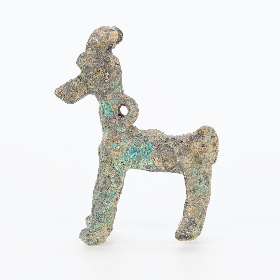 Luristan Iron Age Cast Bronze Goat Pendant: Luristan Iranian early Iron Age cast bronze goat or ibex pendant or amulet.Height: 2 in x width: 3/4 in x depth: 1 1/2 in.