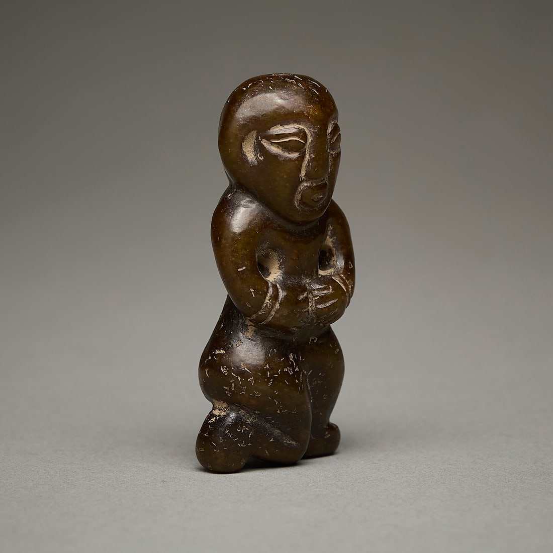 Chinese Carved Jade or Hardstone Kneeling Figure (1 of 4)