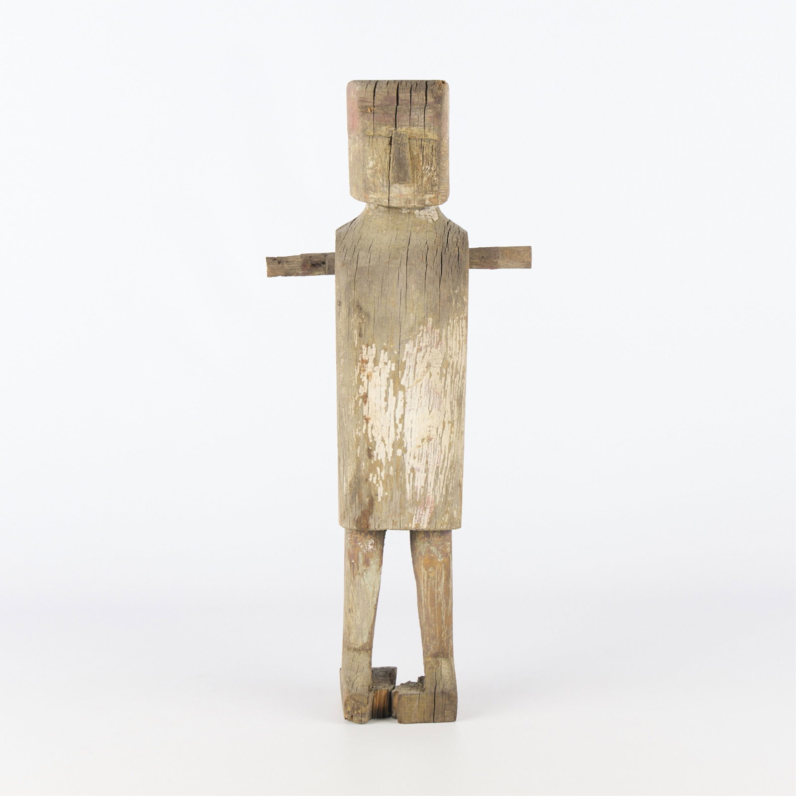 Antique Carved Wood Folk Art Figure: Antique primitive folk art figure. Carved wood. Lacking arms.Height: 18 in x width: 7 1/2 in x depth: 3 in.