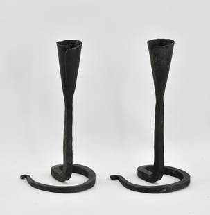 Pair Vintage Wrought Iron Candlesticks: Two candle holders made from wrought iron with spiral style bases.6.75"H x 3.5"Dia.