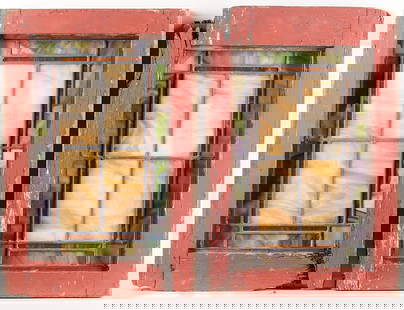 Set 2 Arts & Crafts Stained Glass Windows: Pair of Arts & Crafts slag stained glass windows. Squares and rectangles of yellow, purple-green, and orange. In painted red wood frames. Each, height: 21 3/4 in x width: 14 1/2 in x depth: 1 3/4 in.